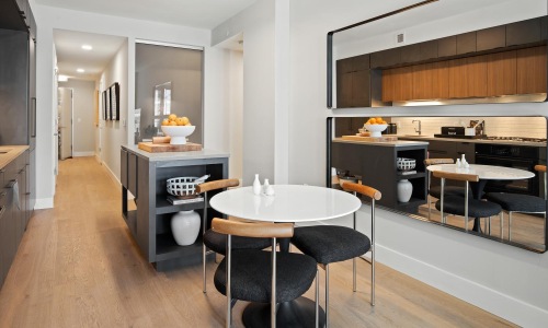 a kitchen with a dining table