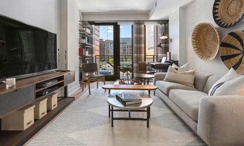 a living room with a tv and couche
