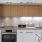 a kitchen with white cabinets
