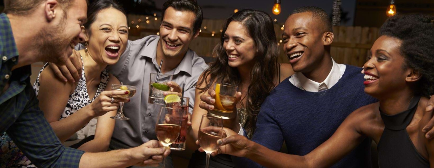a group of people drinking beer