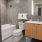 a bathroom with a tub toilet and sink